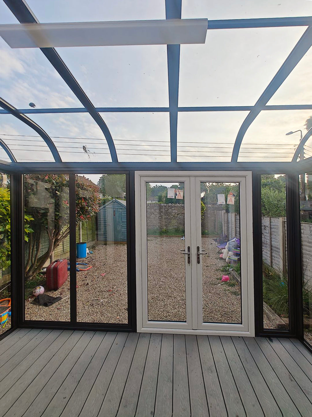 Aluminium canopy with decking and side walls