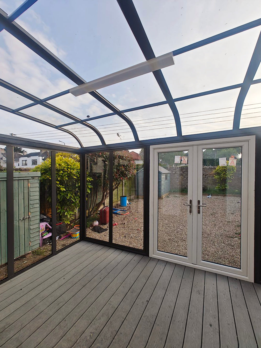 Aluminium canopy with decking and side walls