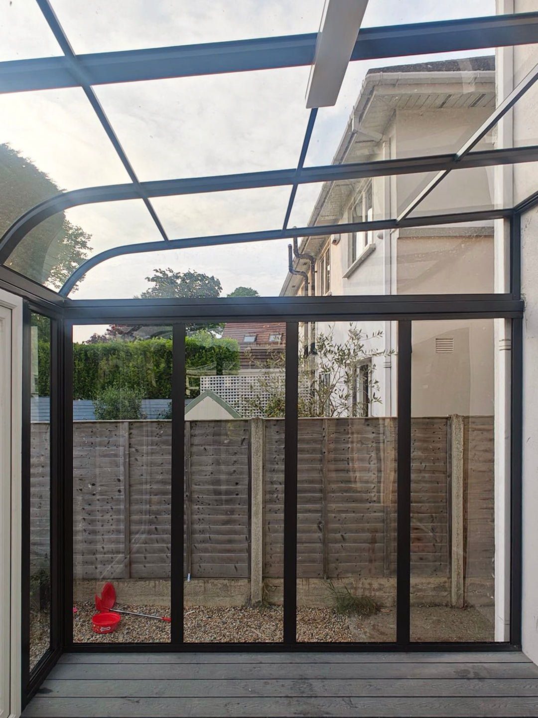 Aluminium canopy with decking and side walls