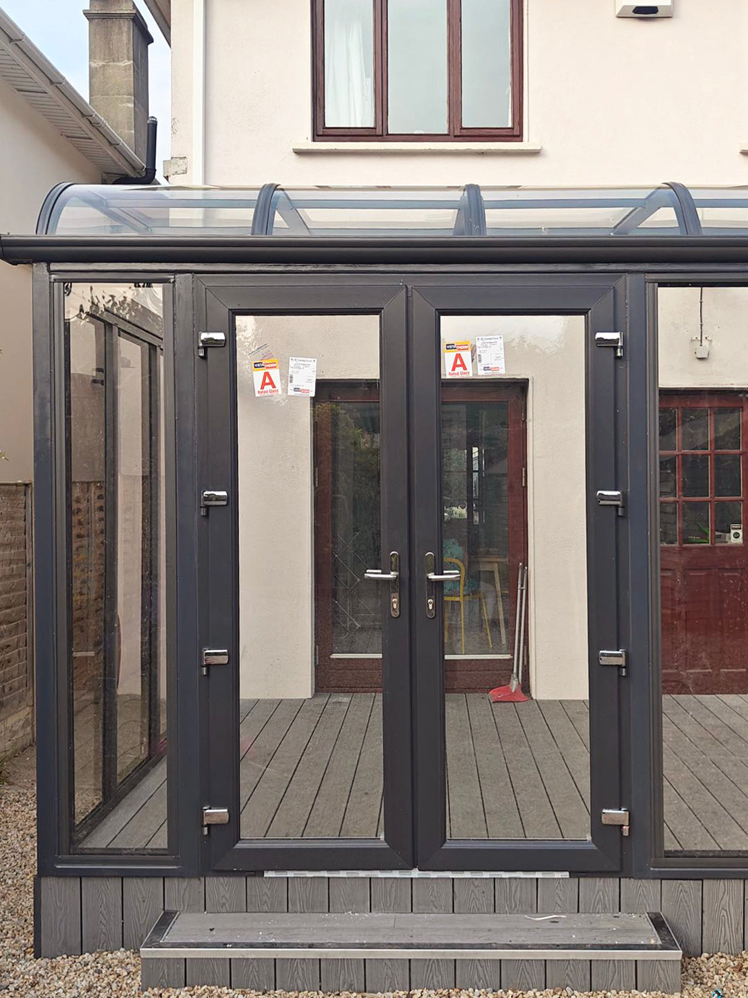 Aluminium canopy with decking and side walls
